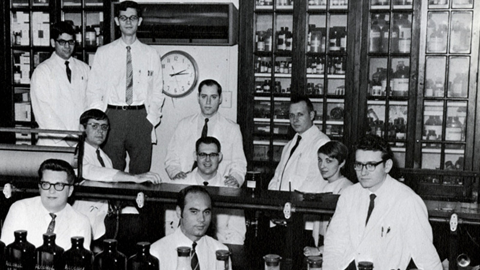 PCOM students posing in a research lab in the 1950s