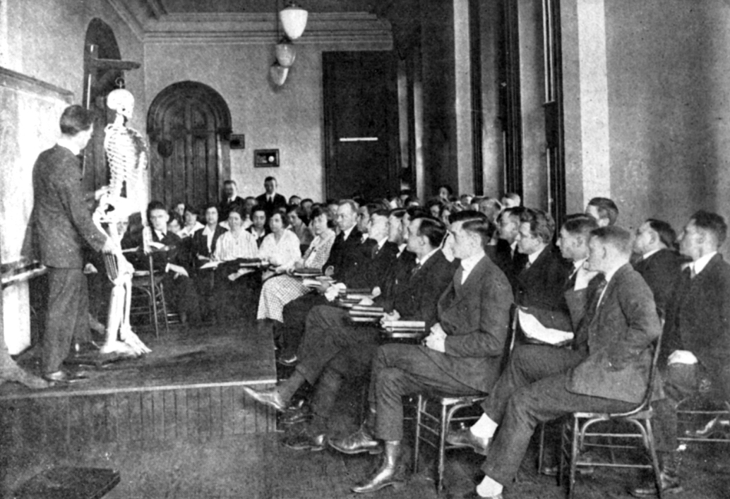 Osteopathic medical students listen to an anatomy lecture in 1923.