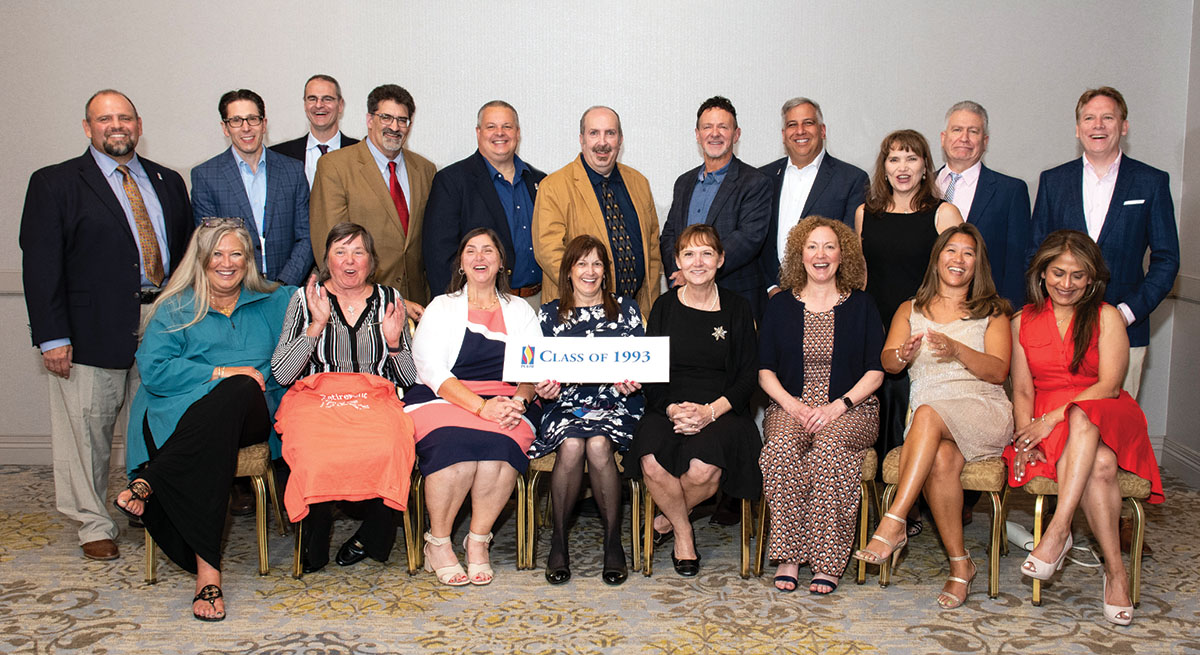 Members of the PCOM DO Class of 1993 smile during a reunion event in 2023.