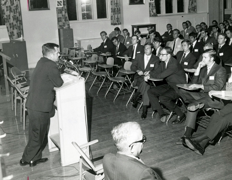 Robert W. England, DO '56, addresses a class at PCO's campus at 48th and Spruce Streets (1960s).