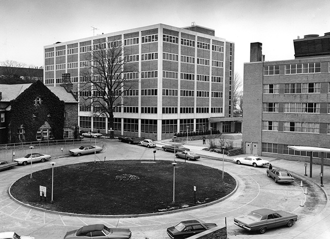 The Frederic H. Barth Pavilion of the Hospitals of PCOM opened in 1968 (right-most building). PCOM's Howard A. Hassman, DO ’83 Academic Center (formerly known as Evans Hall, shown center) was completed in 1973. The Levin building can be seen on the left.