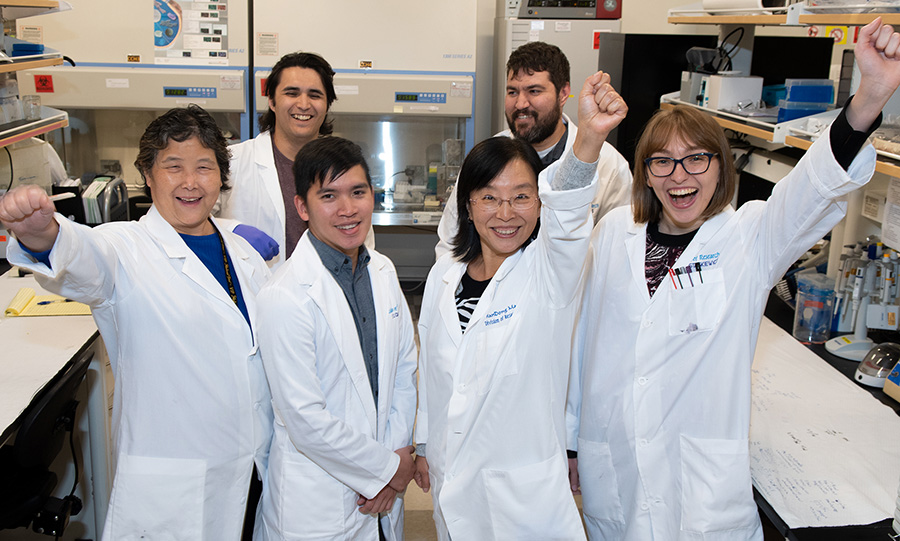 PCOM Georgia research faculty and students in a laboratory, 2022.