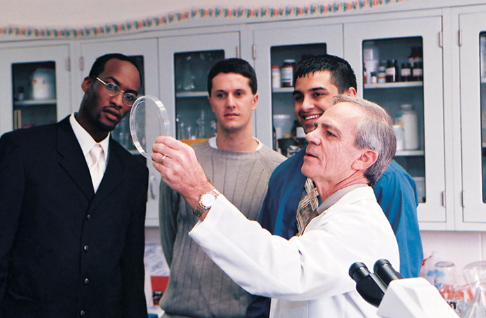 Dr. Hitner teaches medical and graduate students in a research lab, 2001.
