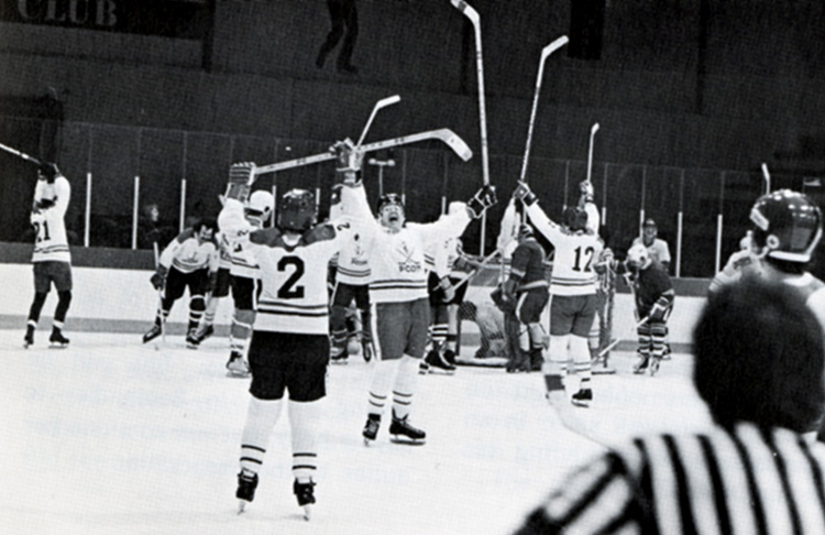The PCOM ice hockey team celebrates a victory (1970s).