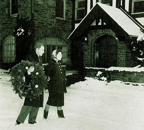 Students walk past the Levin Administration Building during the holidays.