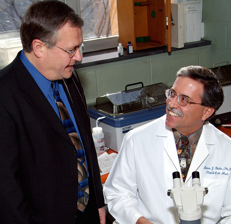 2004 photo of Robert Lloyd, DO, and Brian Balin, PhD.