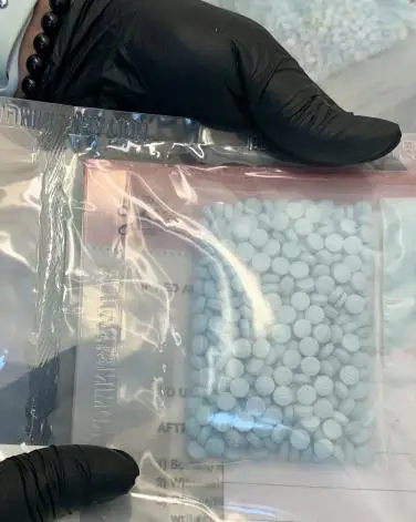 A bag of blue pills.