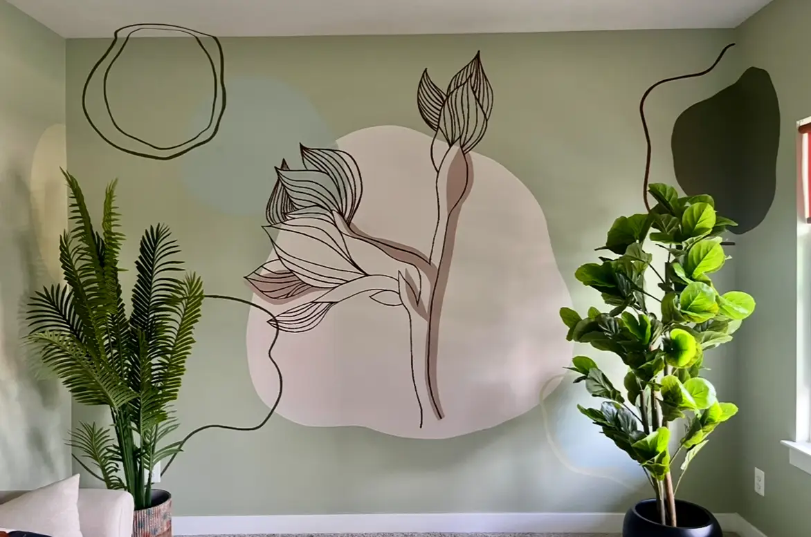A botantical drawing on a green wall