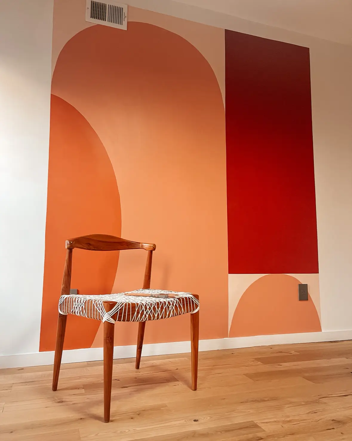 Colorful geometric shapes painted on a wall