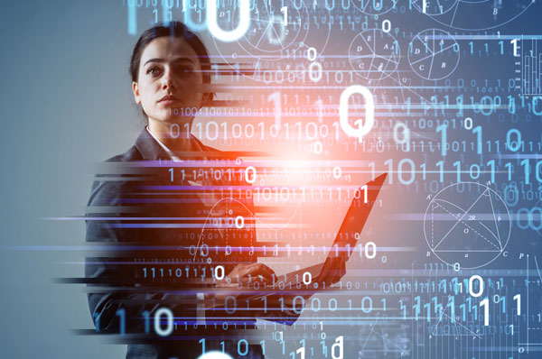 A woman in a business suit is surrounded by holographic computer code.
