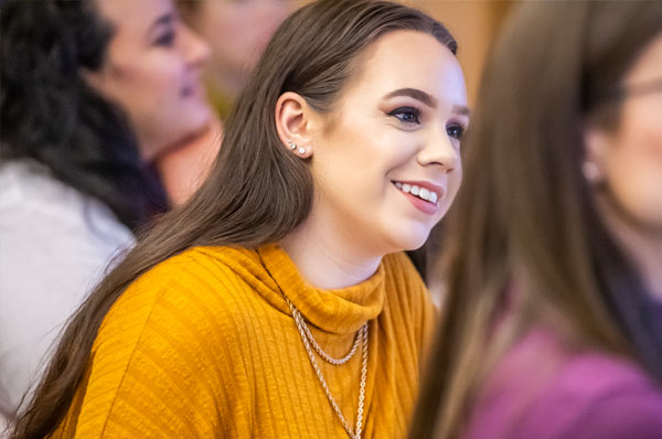 Student listens attentively during class lecture