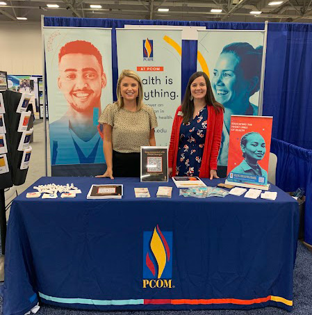 Handouts, brochures, SWAG and display banners at a PCOM admissions recruitment event