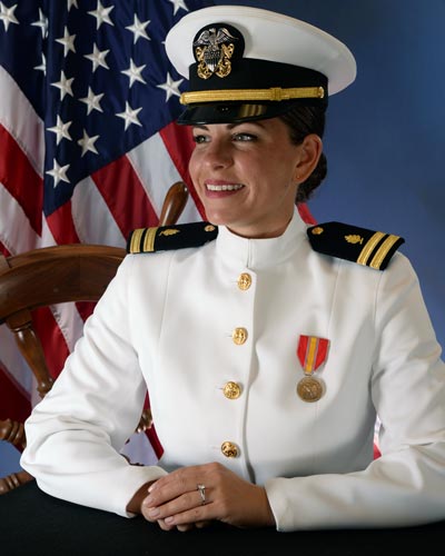 Samantha Giangrande, PsyD '19, smiles in her Navy uniform