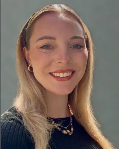 Headshot photo of PCOM applied positive psychology program graduate Kate Delaney, MS/APP '25
