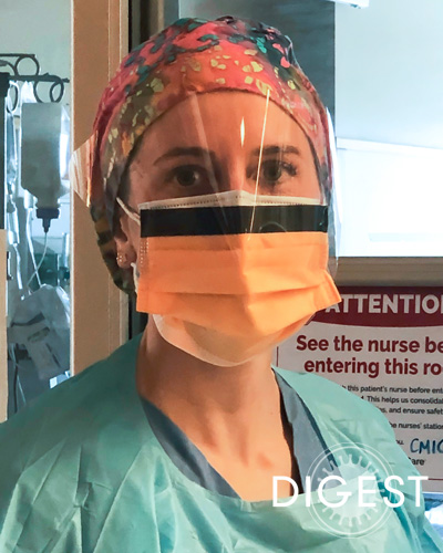 Lauren Tavani Sottile, MS/PA-C '08, wearing protective gear in a hospital