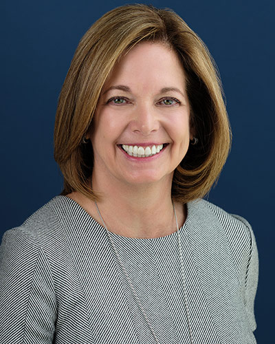 Headshot photograph of Theresa Moore Becker, DO ’90