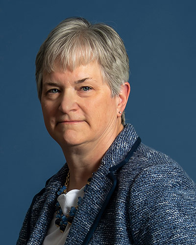 Headshot photograph of Deborah A. Bren, DO ’84