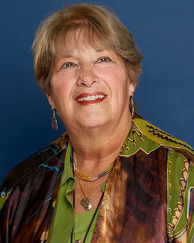 Headshot photograph of Maria F. Daly, DO ’84, FACOFP