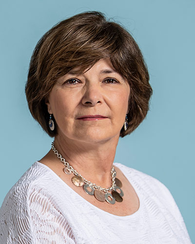 Headshot photograph of Marina N. Vernalis, DO ’77, FACC