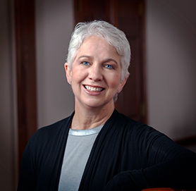 Professional headshot photograph of Karen E. Arscott, DO '86