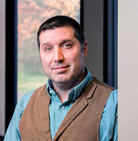 Headshot photograph of Col. Ret. Kary John Schroyer, DO '97