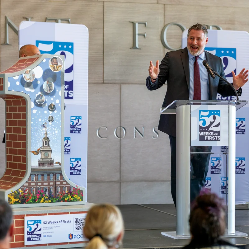 Dr. Peter Bidey on stage at PCOM’s America250 celebration kickoff