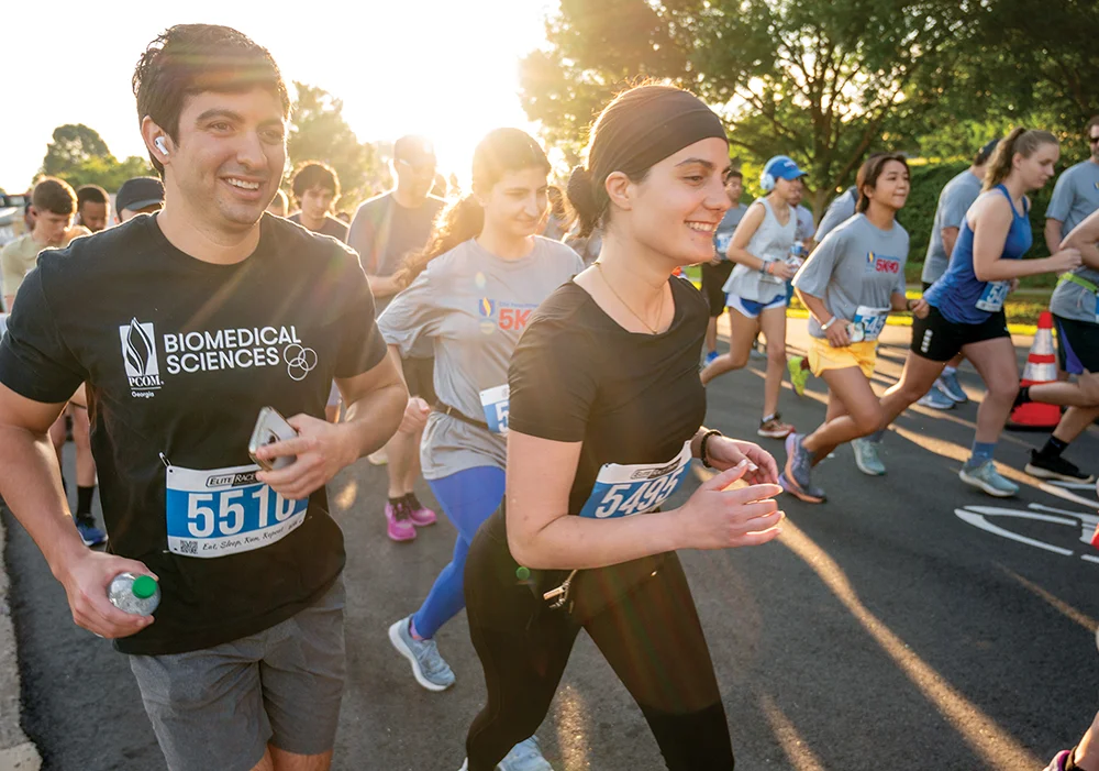 More than 150 participants joined the PCOM Georgia Blaze 5K to celebrate 20 years of PCOM Georgia. The scenic course wove through downtown Suwanee and the Brushy Creek Greenway, and funds raised will support scholarships, helping to empower the next generation of clinicians.