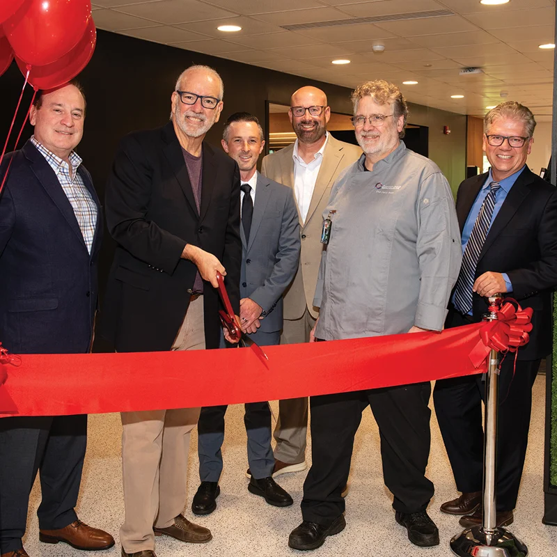 PCOM leadership at ribbon cutting of PCOM Cafe