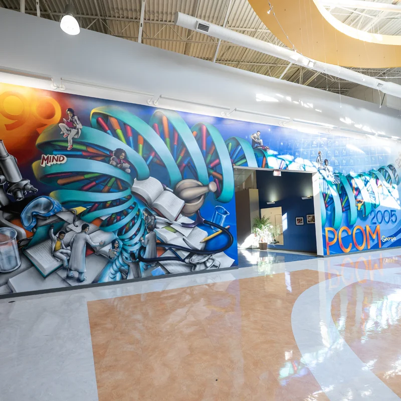 PCOM Georgia's DNA Art Mural on a wall at the Suwanee campus
