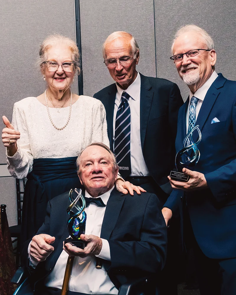 Group of people accept award