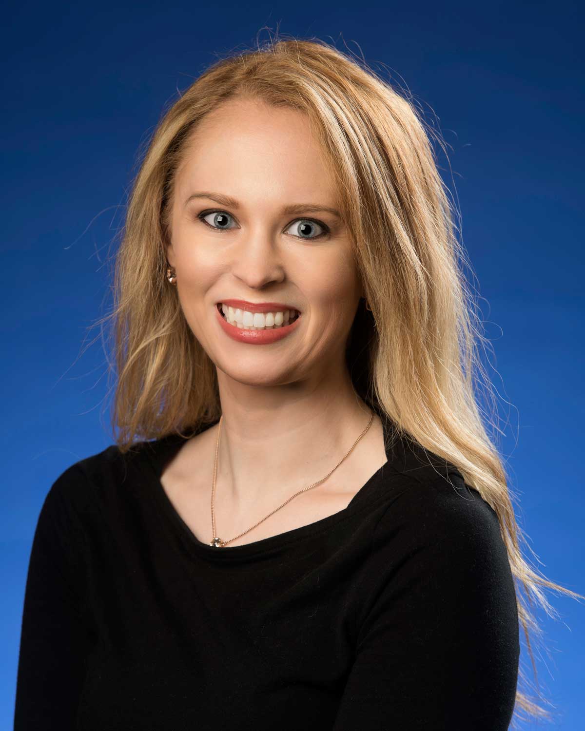 Headshot photograph of Caroline Champion, PharmD, BCACP