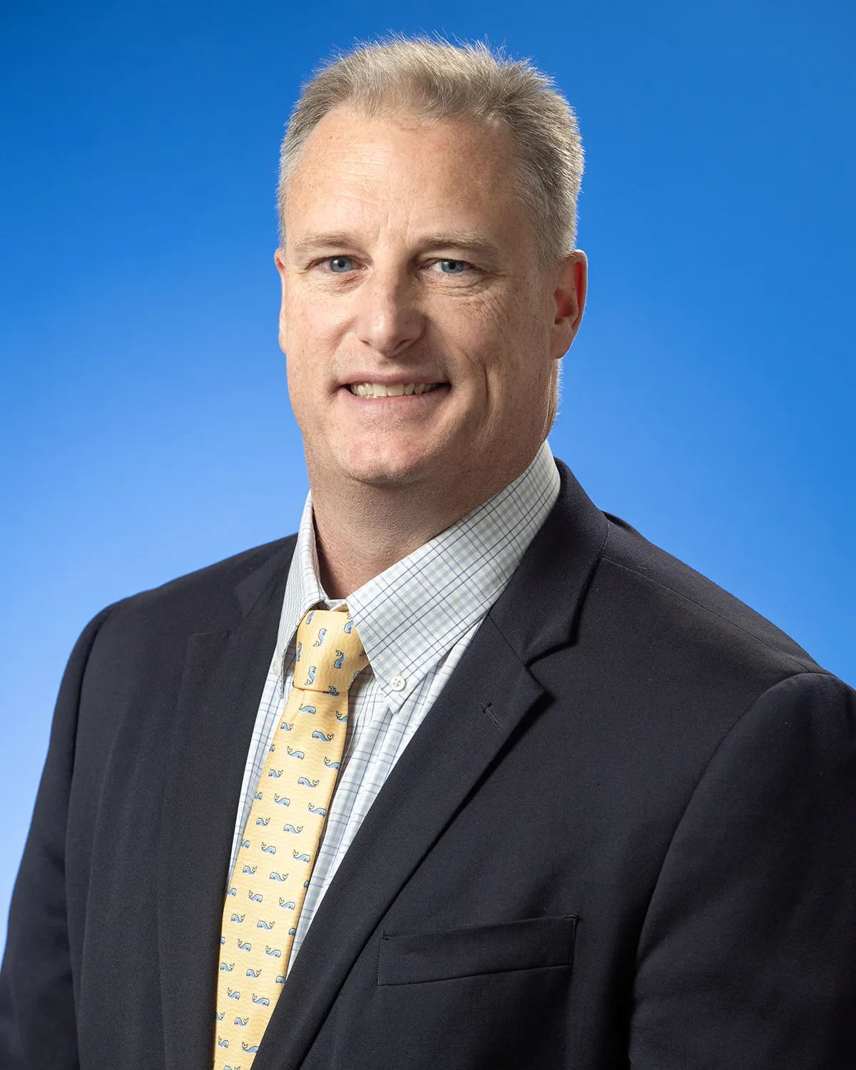 Professional headshot photo of PCOM dean Brian Mann, EdD, MS, PA-C