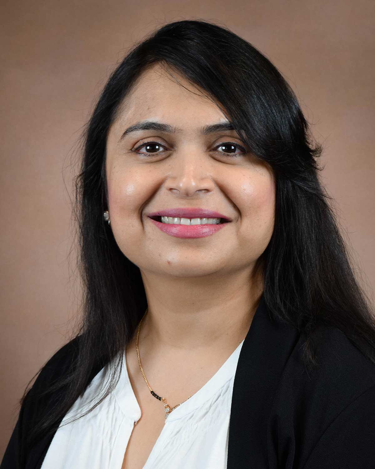 Professional headshot photograph of PCOM South Georgia pharmacology professor Nikita Mirajkar, PhD