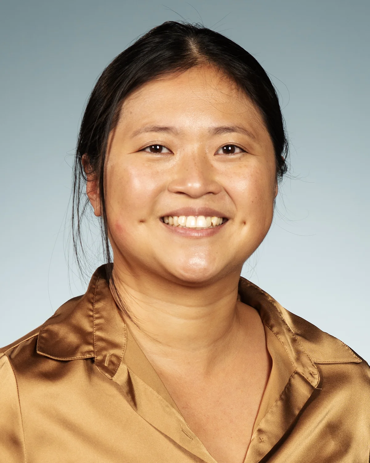 Professional headshot photo of PCOM faculty member Nina Li, MMS, PA-C