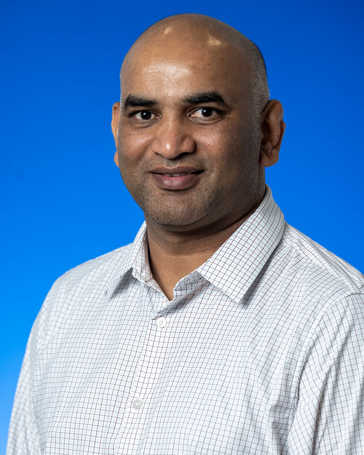 Professional headshot photo of Sameer Joshi, BPharm, MS, MRes, PhD