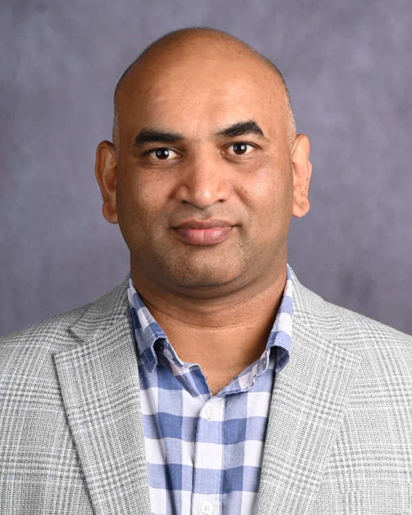 Professional headshot photo of Sameer Joshi, BPharm, MS, MRes, PhD