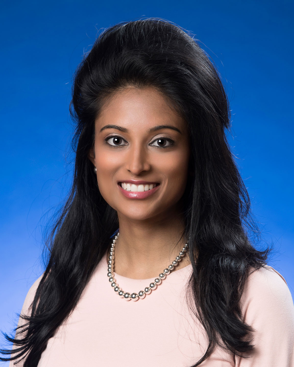 Professional headshot photograph of Dr. Sonia Amin Thomas.