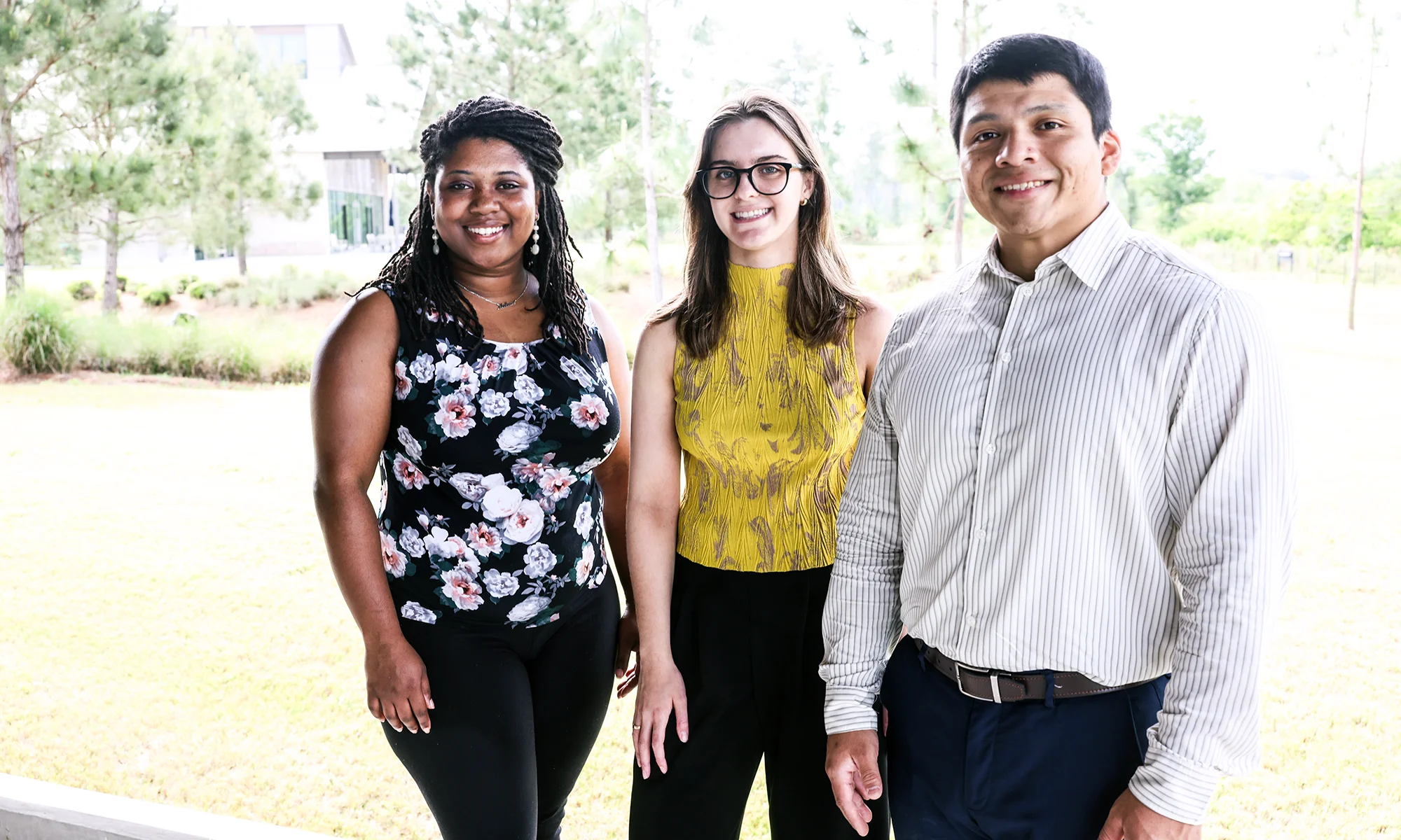 Grad students smiling on the back porch study area at PCOM's South Georgia campus location