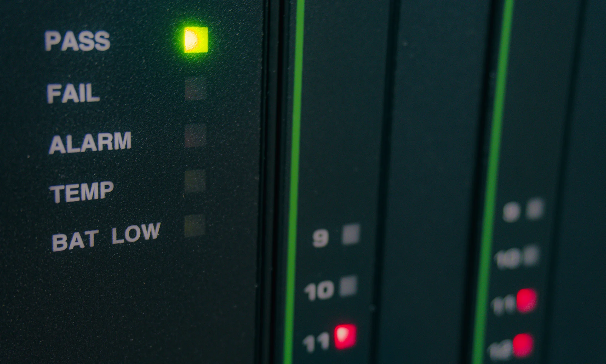 Macro image of buttons and lights on a server rack