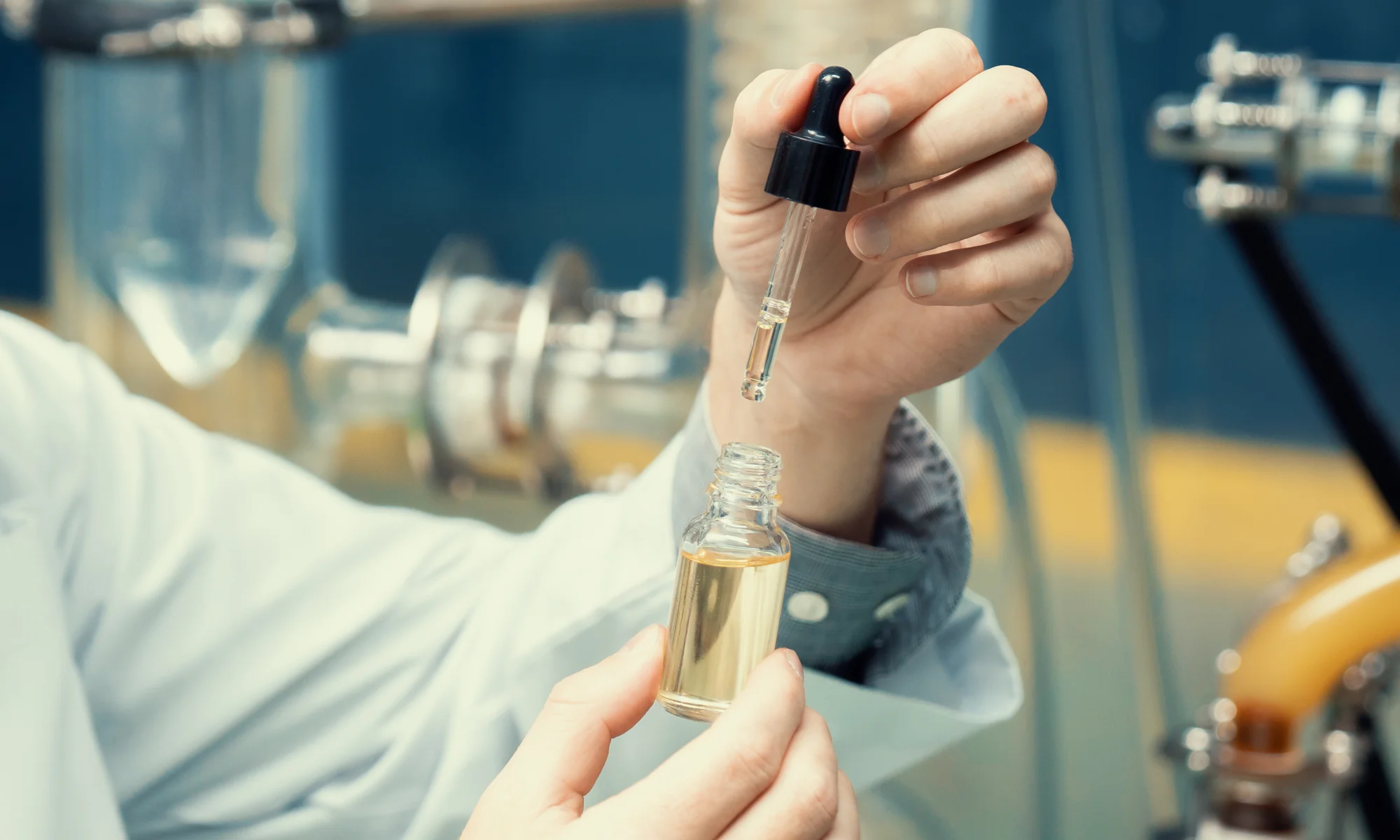 PCOM researcher working with medicinal cannabis sample in a laboratory