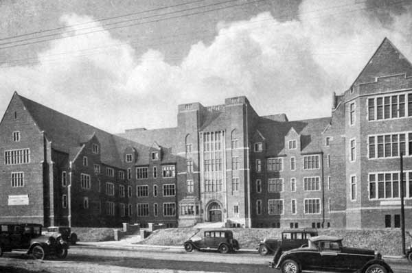 Black and white photo of large PCOM college building located at Spruce Street