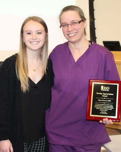 Professor Diana Peterson, PhD, is presented with a Faculty Appreciation Award