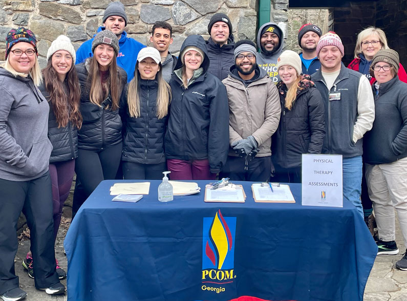 DPT students and faculty pose at an Appalachian Trail Injury and Prevention Clinic