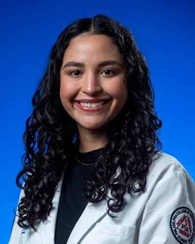Professional headshot of Elaine Garcia-Colon, MS/PA '26, in white coat