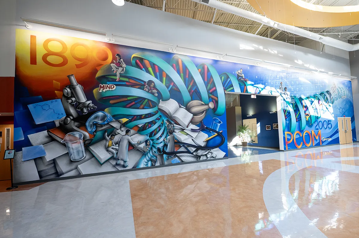 A wide view of the new mural inside PCOM Georgia's Suwanee campus