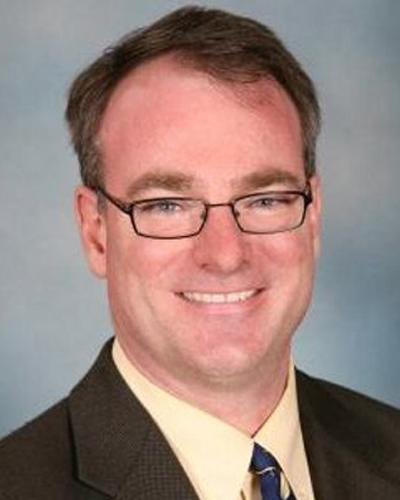 Professional headshot of Chief Academic Technology Officer Erik Langenau, DO, MS