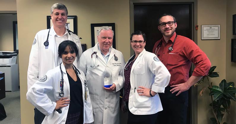 Photograph of Dr. Anderson and GA-PCOM medical students