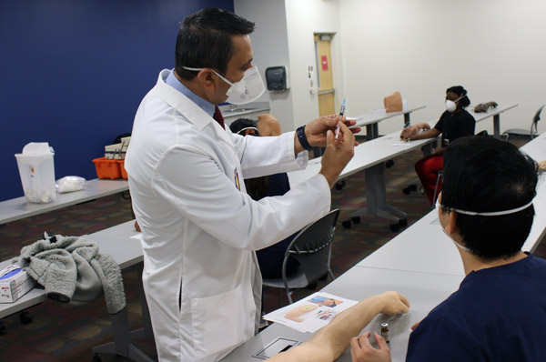 Moradi and Little Explain College's Vaccine Efforts to FOX 5 Atlanta's Yu