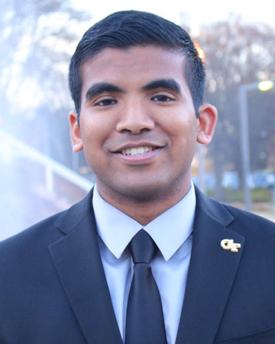 Headshot photograph of Varun Yarabarla (DO '21) wearing a suit.