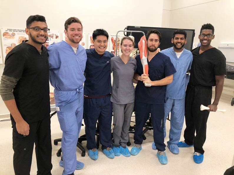 Danny Martinez poses with classmates